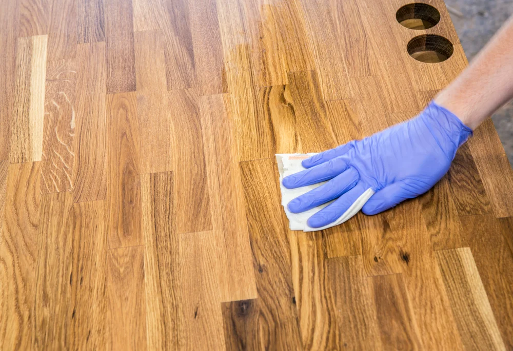 cleaning butcher block counter tops, showing how to care for butcher block countertops