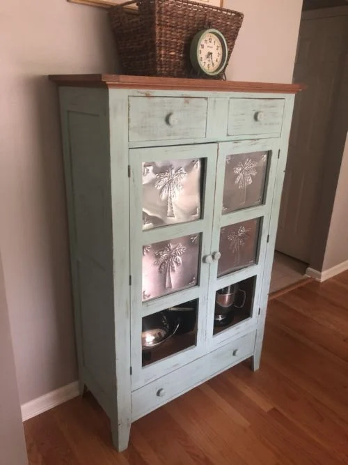 step by step on how to paint a distressed wood cabinet