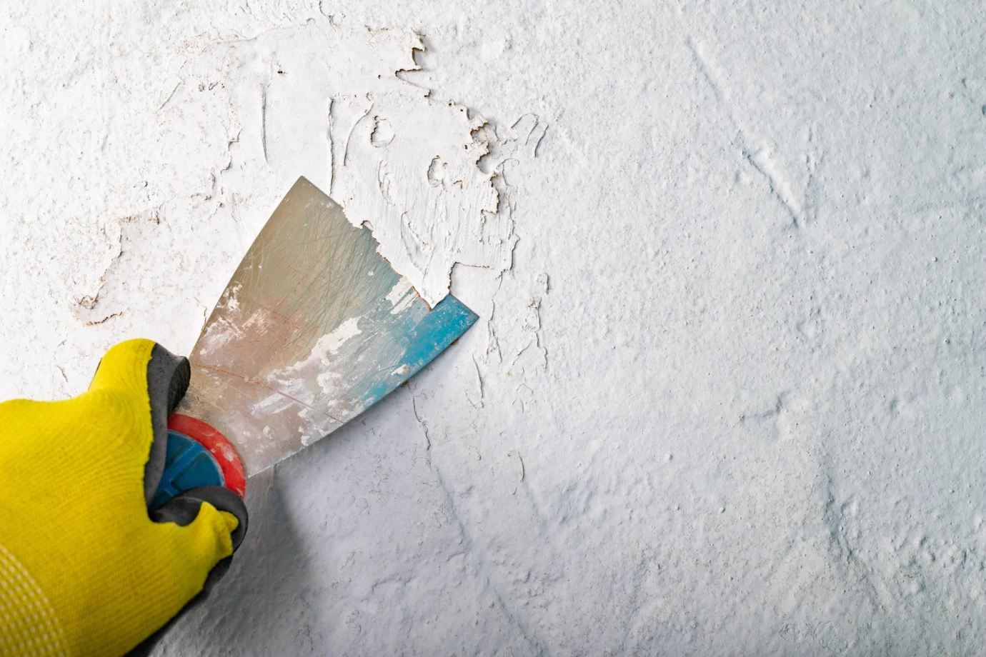 peeling paint with scalpel