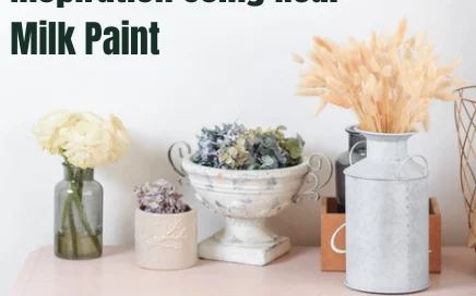 Vintage decorating ideas with a pastel painted dresser, rustic clock, and floral accents