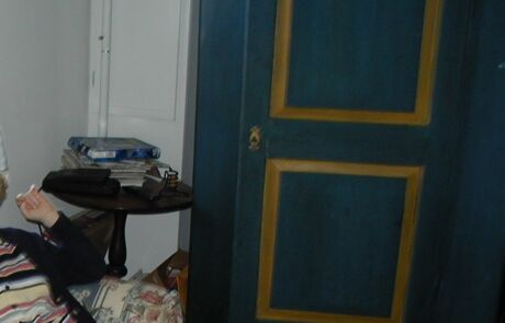 Media cabinet painted in yellow and blue Real Milk Paint