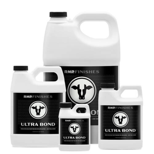 Group of bottles of RMP Finishes Ultra Bond milk paint additive.