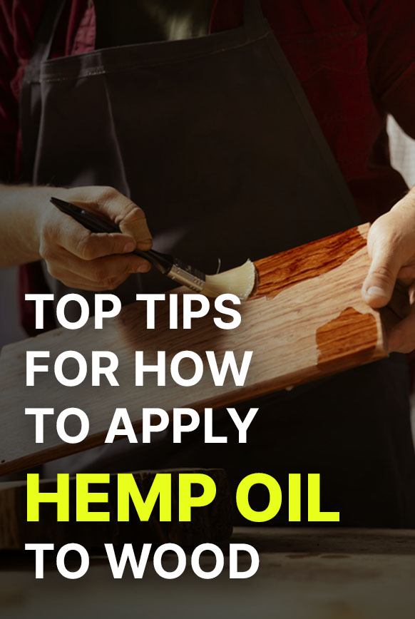 Woodworking specialist applying hemp oil to wood