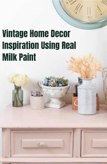 Vintage decorating ideas with a pastel painted dresser, rustic clock, and floral accents